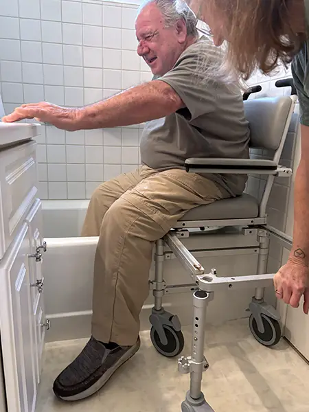 Ken trying out the Nuprodx MC6000 tub slider system in his bathroom